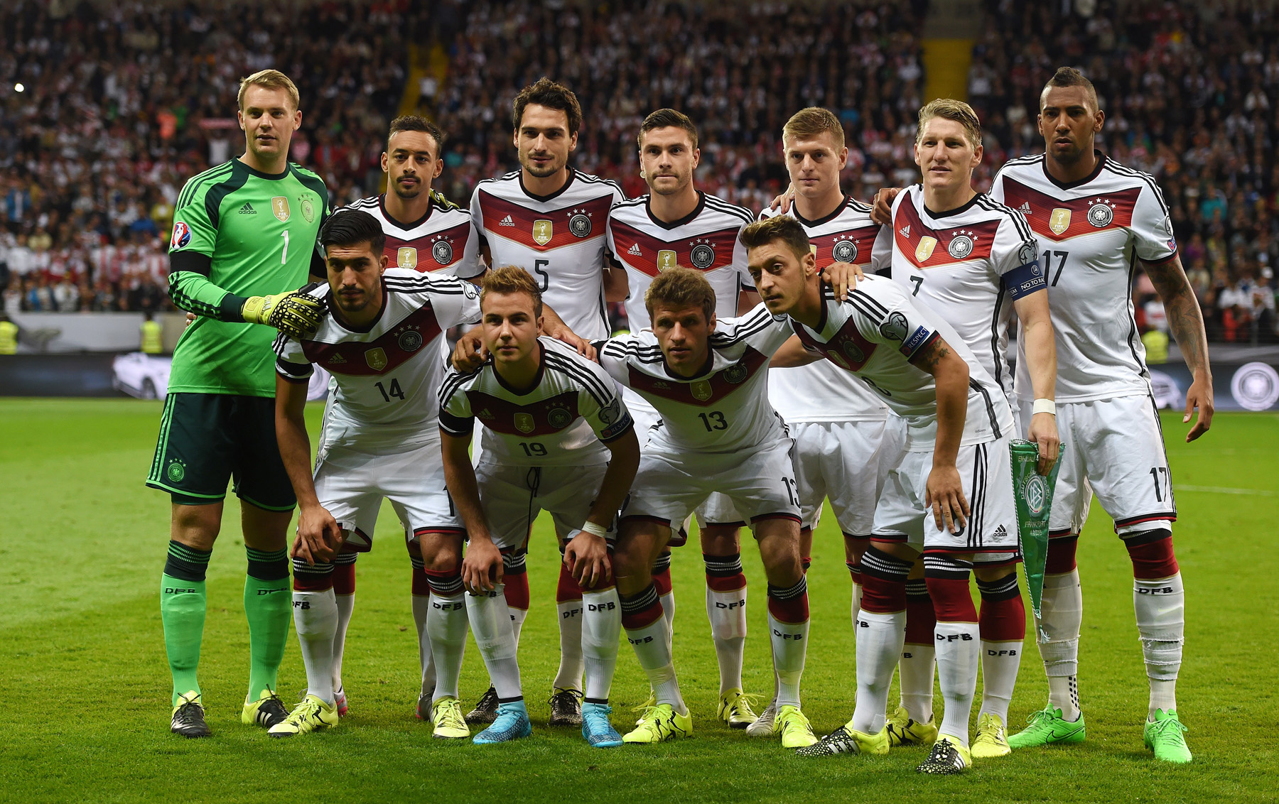 Germany's players ( Back row L to R) Germany's goalkeeper Manuel Neuer, Germany's forward Karim Bellarabi, Germany's defender Mats Hummels, Germany's defender Jonas Hector, Germany's midfielder Toni Kroos, Germany's midfielder Bastian Schweinsteiger and Germany's defender Jerome Boateng, (front row L to R) Germany's midfielder Emre Can, Germany's forward Mario Goetze, Germany's midfielder Thomas Mueller and Germany's forward Mesut Ozil pose for a picture ahead of the Euro 2016 qualifying football match between Germany and Poland in Frankfurt am Main, central Germany, on September 4, 2015. AFP PHOTO / PATRIK STOLLARZ (Photo credit should read PATRIK STOLLARZ/AFP/Getty Images)