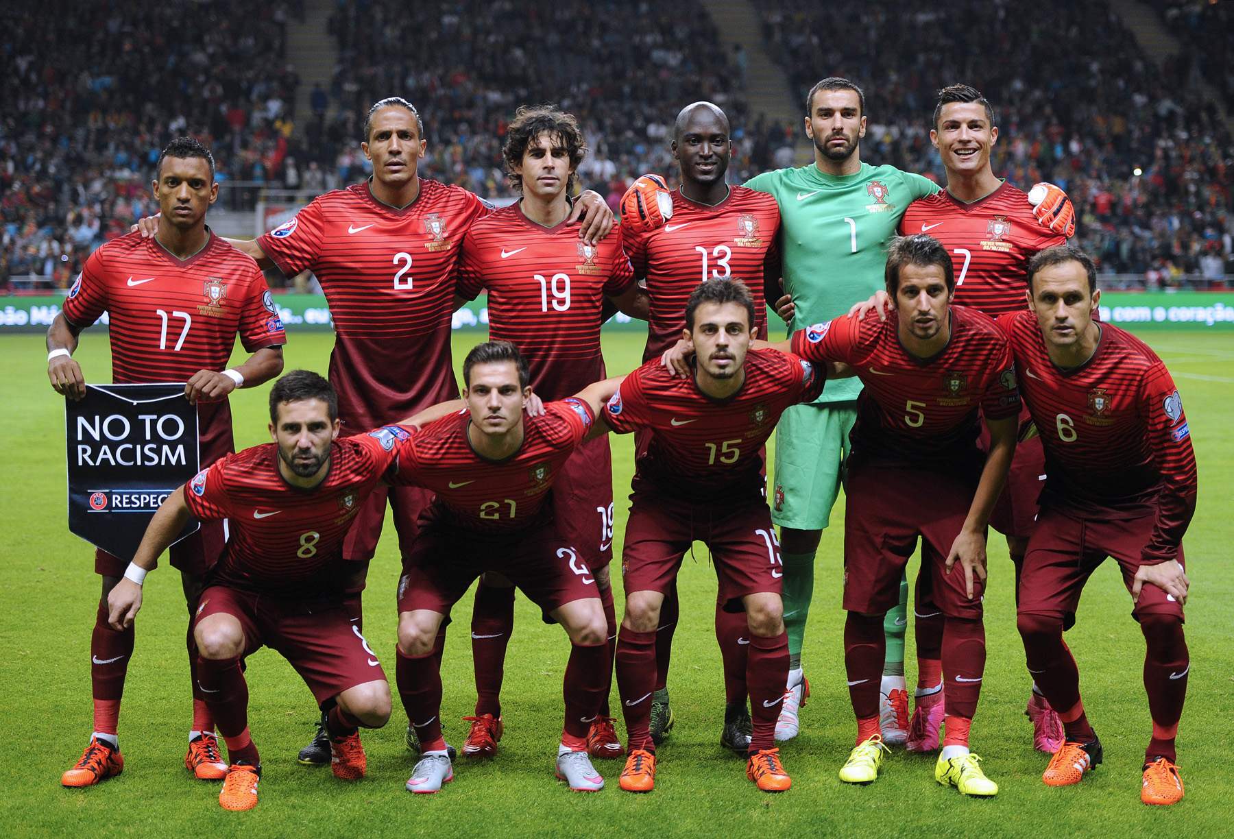 Portugal's players (top L-R) forward Nani, defender Bruno Alves, midfielder Tiago, midfielder Danilo Pereira, goalkeeper Rui Patricio, forward Cristiano Ronaldo and (bottom L-R) midfielder Joao Moutinho, defender Cedric Soares, midfielder Bernardo Silva, defender Fabio Coentrao and defender Ricardo Carvalho pose before the Euro 2016 qualifying football match Portugal vs Denmark at the Municipal stadium in Braga on October 8, 2015. Portugal won the match 1-0. AFP PHOTO/ MIGUEL RIOPA (Photo credit should read MIGUEL RIOPA/AFP/Getty Images)