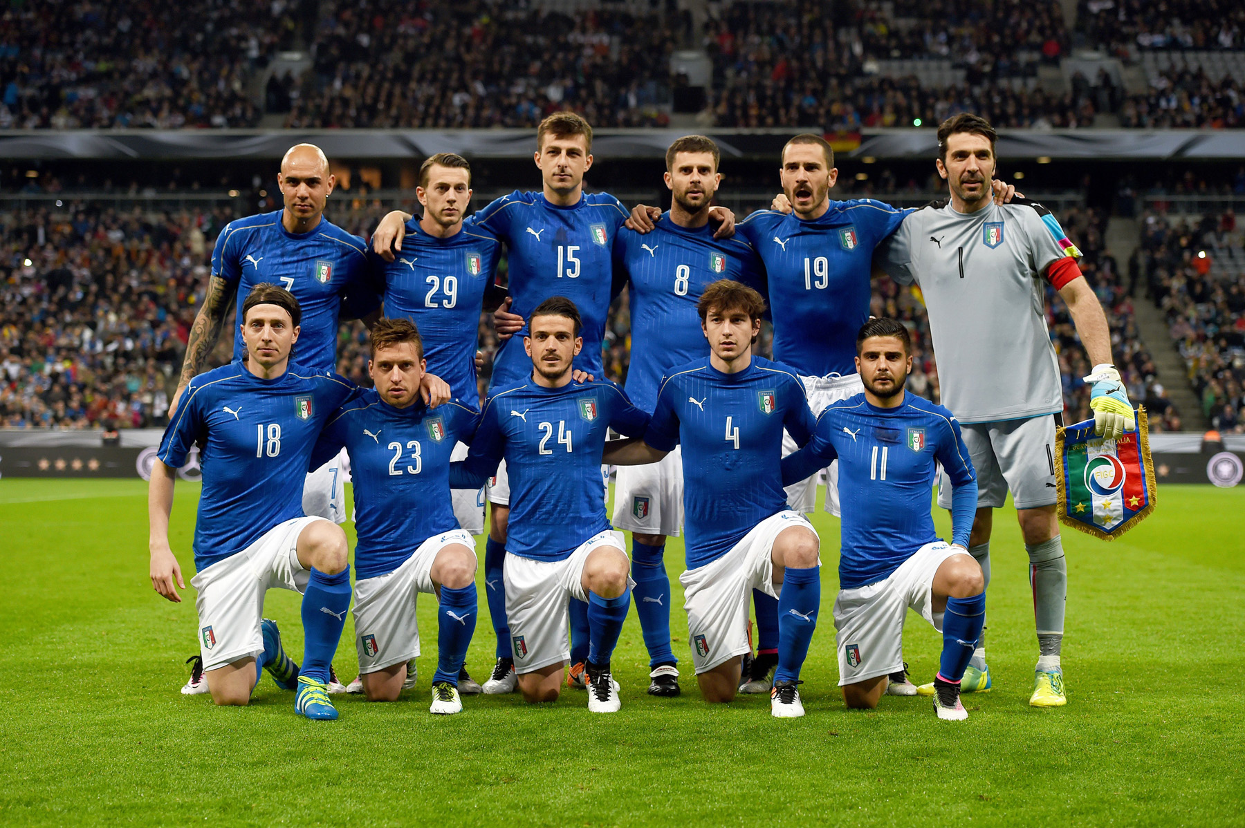 Italy´s players (From L, back row) forward Simone Zaza, defender Federico Bernarderschi, defender Francesco Acerbi, defender Thiago Motta, defender Leonardo Bonucci and goalkeeper Gianluigi Buffon (From L, front row) midfielder Riccardo Montolivo, midfielder Emanuele Giaccherini, midfielder Alessandro Florenzi, defender Matteo Darmian and forward Lorenzo Insigne pose for team picture prior to the friendly football match Germany vs Italy in Munich, southern Germany on March 29, 2016. / AFP / PATRIK STOLLARZ (Photo credit should read PATRIK STOLLARZ/AFP/Getty Images)