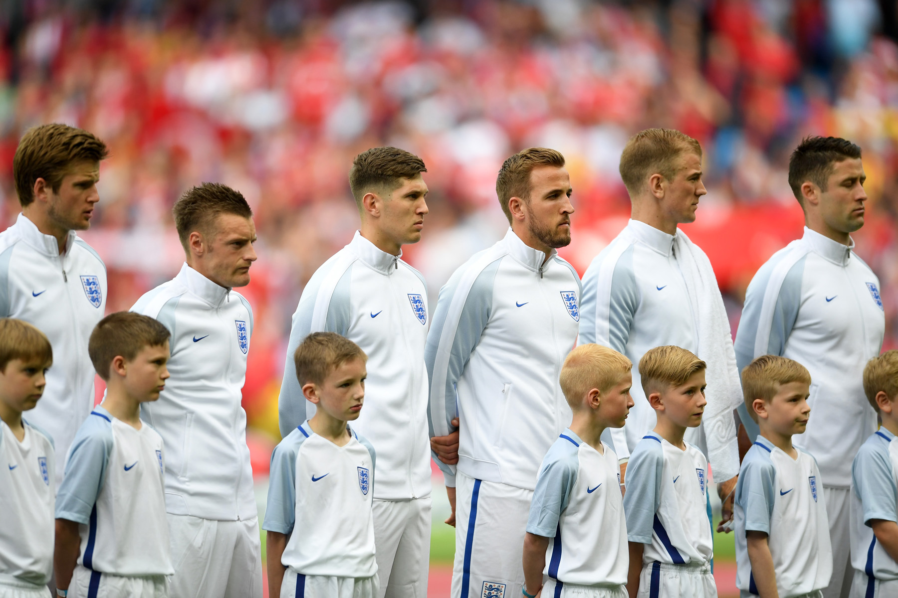 MANCHESTER, ENGLAND - MAY 22: (L-R) Eric Dier, Jamie Vardy, John Stones, Harry Kane, Joe Hart and Gary Cahill of England line up before the International Friendly match between England and Turkey at Etihad Stadium on May 22, 2016 in Manchester, England. (Photo by Laurence Griffiths/Getty Images)